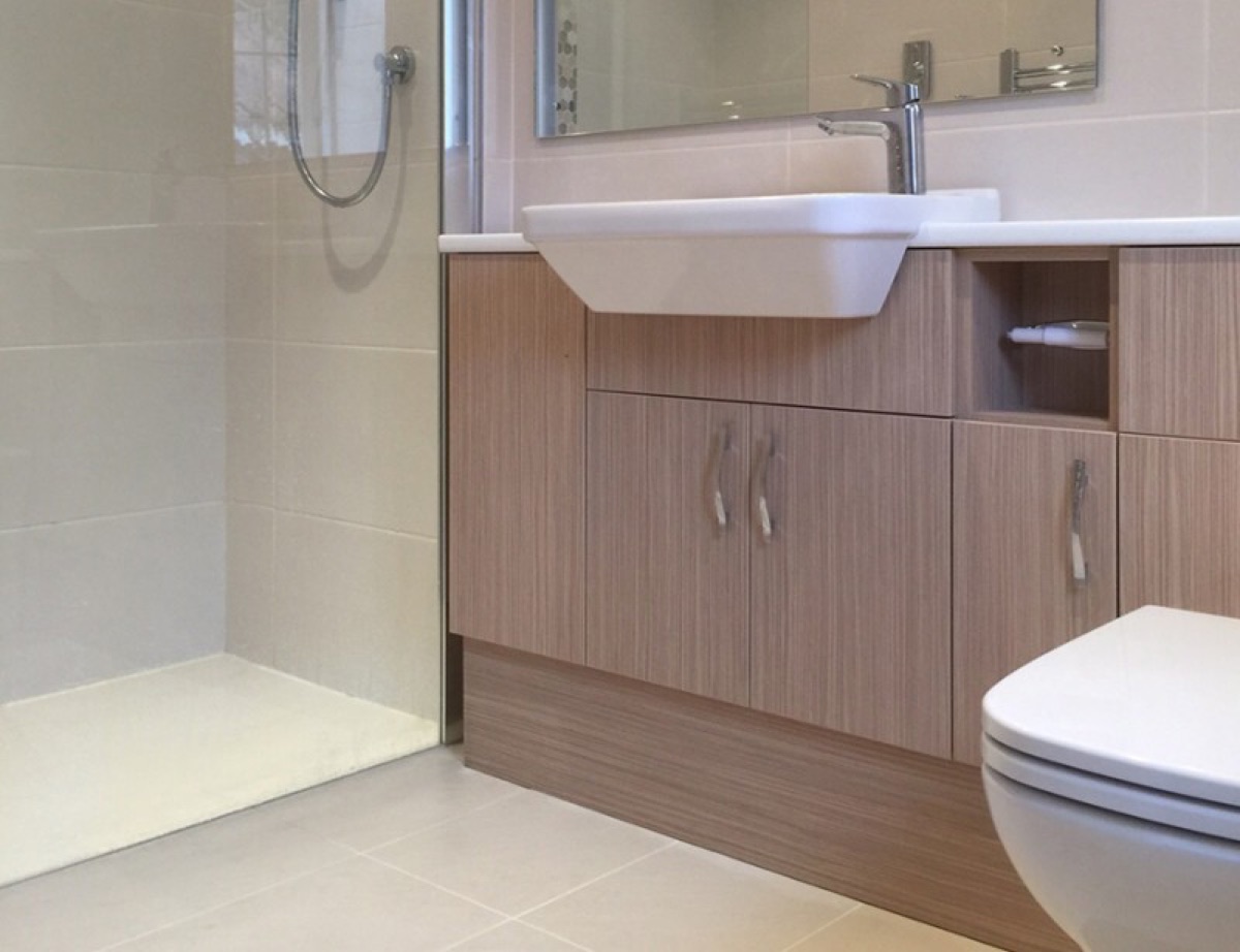 Bathroom plumbing installation with basin and shower