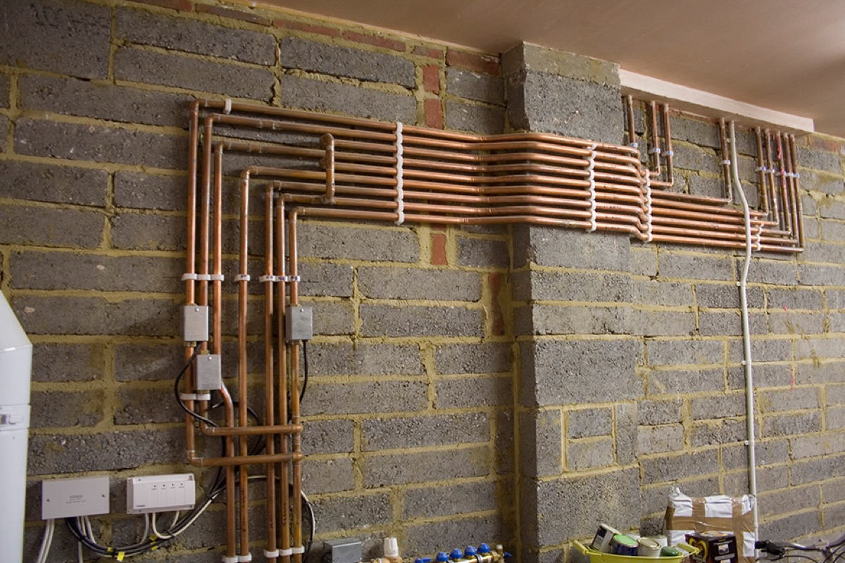 Neat copper heating pipework and controls